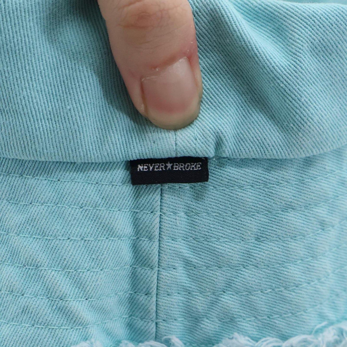 “2028” Limited Edition Distressed Denim Bucket Hat